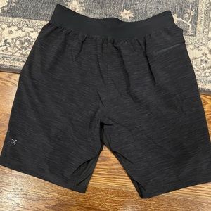Men’s Lululemon Shorts / Size medium / Color is a dark gray / 9 inch inseam